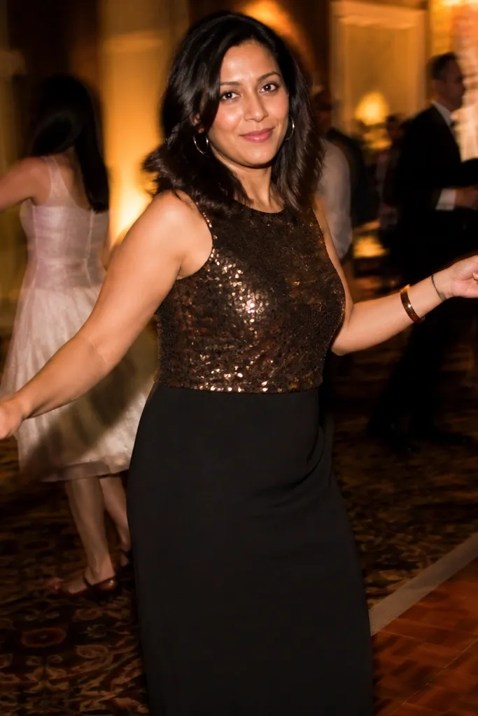 Black and bronze sequin top midi dress with a crepe skirt